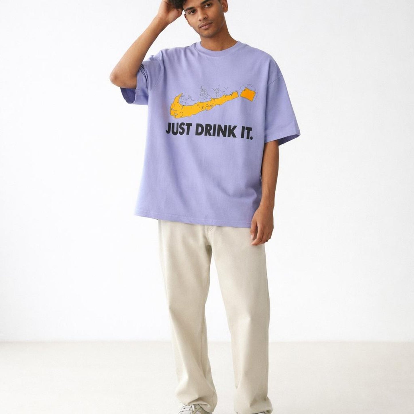 Just Drink It | Oversized T-Shirt | Lavender · on a man