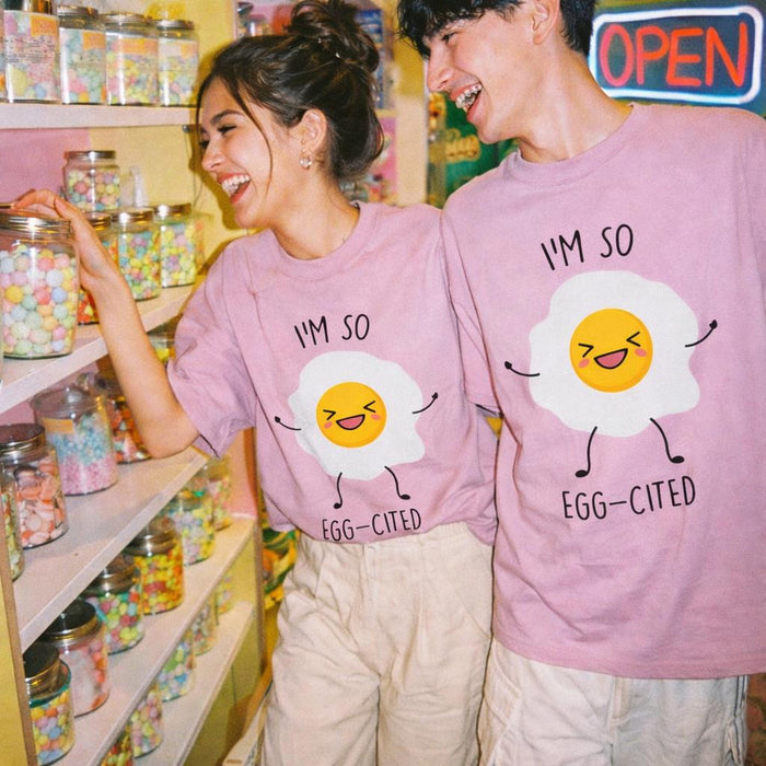 Egg-Cited | Oversized Classic T-Shirt | Smiley Egg Graphic — front view