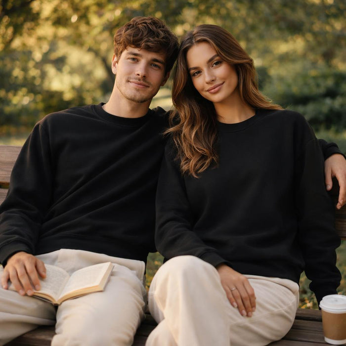 The Onyx Standard | Sweatshirt | Pure Black · on a man and a woman