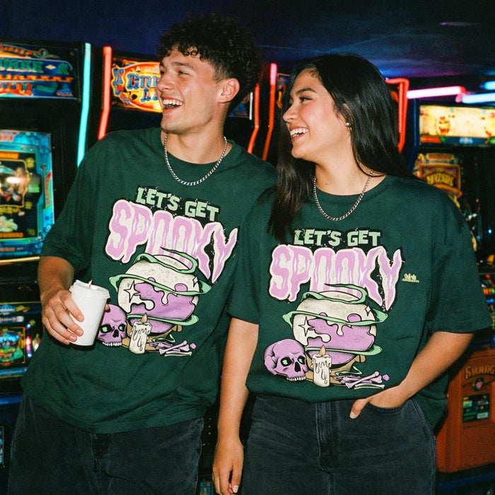 Spooky Feast | Oversized T-Shirt | Bottle Green · on a man and a woman