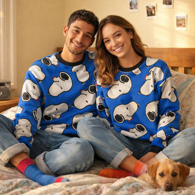 SnoozePup | Sweatshirt | Sketch Dogs on Blue · on a man and a woman