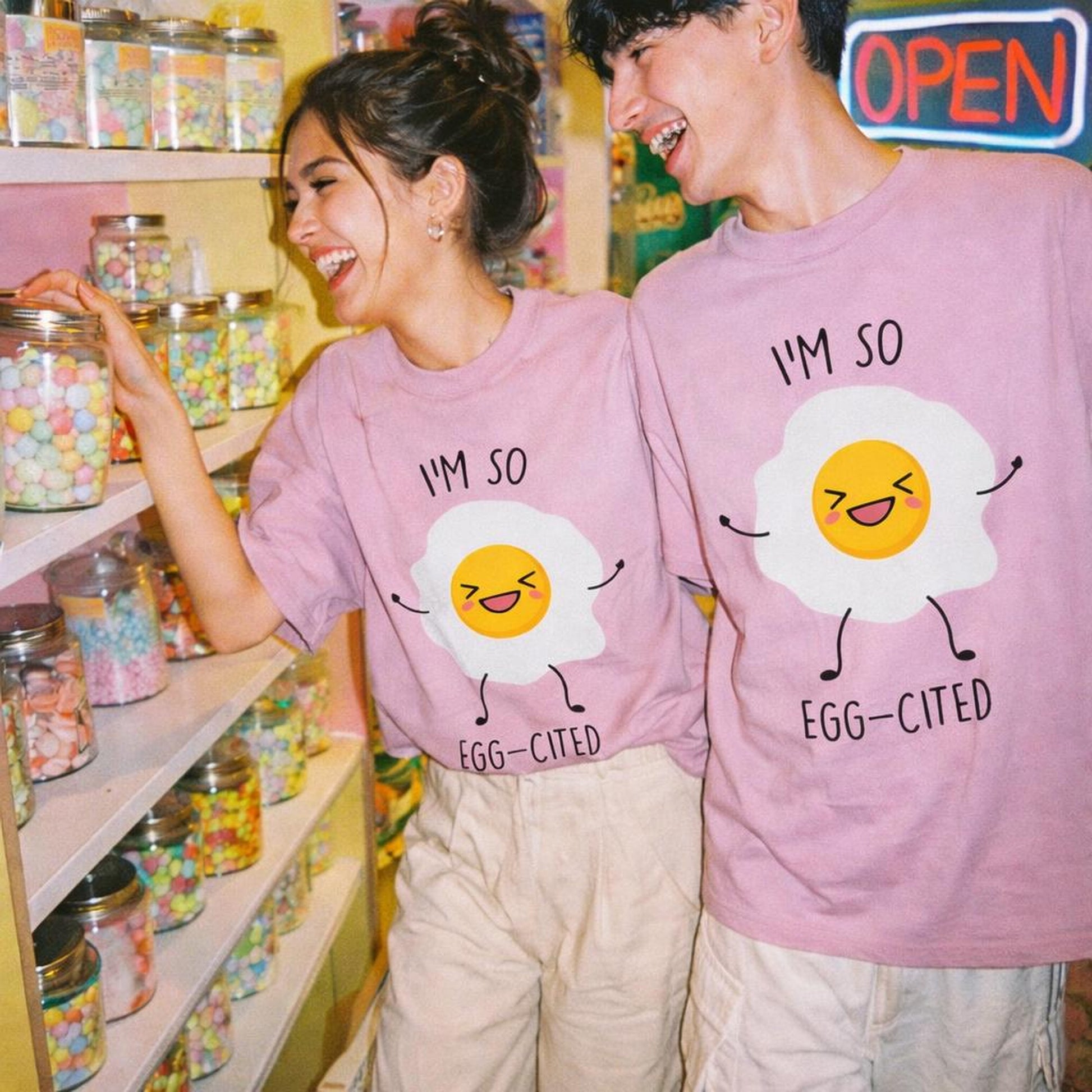 Egg-Cited | Oversized Classic T-Shirt | Smiley Egg Graphic — front view