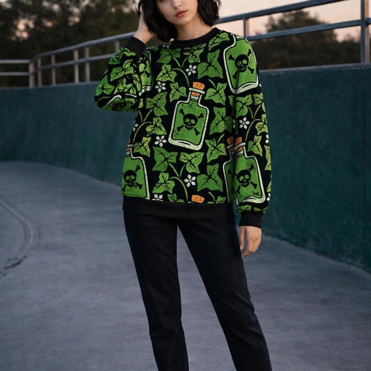 Dark Garden | Sweatshirt | Gothic Ivy & Skull Bottles · on a woman