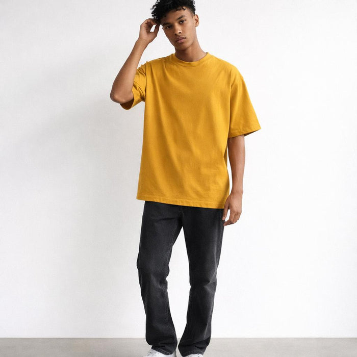 Warm Yellow | Oversized Classic T-Shirt | Mustard Plain · on a man