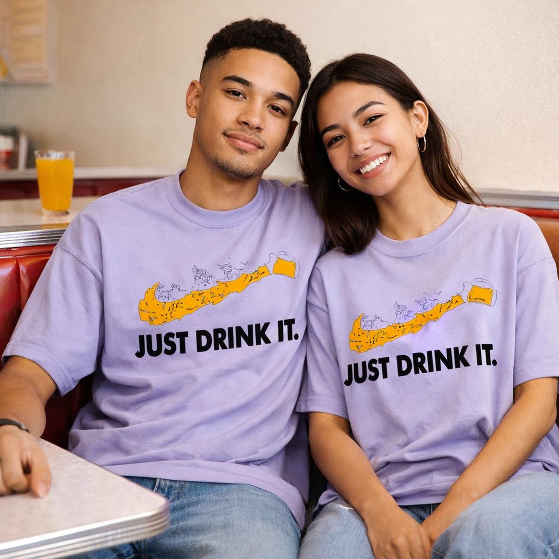 Just Drink It | Oversized T-Shirt | Lavender · on a man and a woman