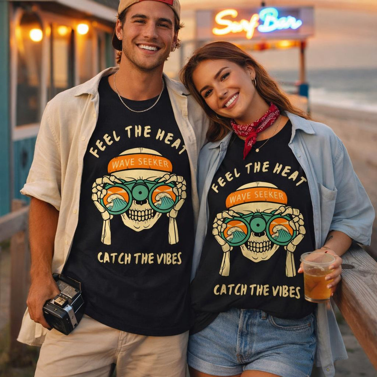 Wave Seeker | Oversized T-Shirt | Skull Surfer Graphic · on a man and a woman