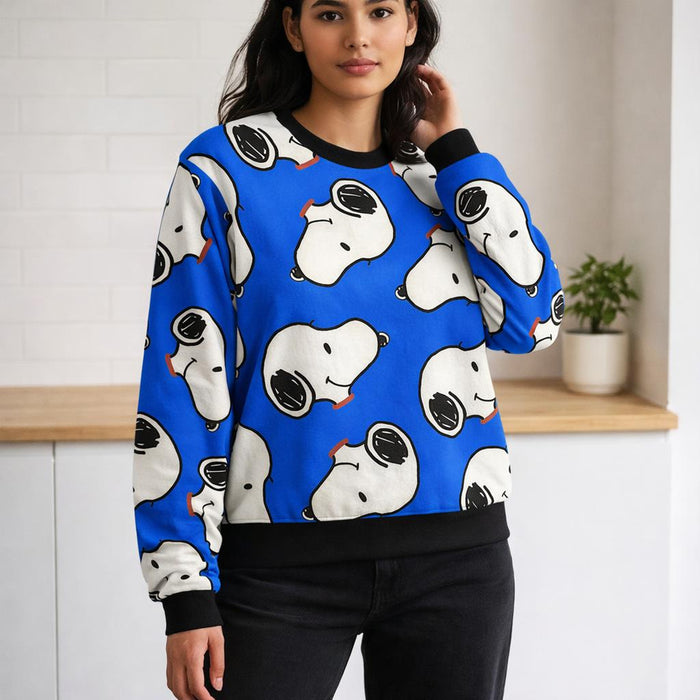 SnoozePup | Sweatshirt | Sketch Dogs on Blue · on a woman