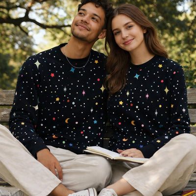 Starry Whimsy | Sweatshirt | Cosmic Black · on a man and a woman